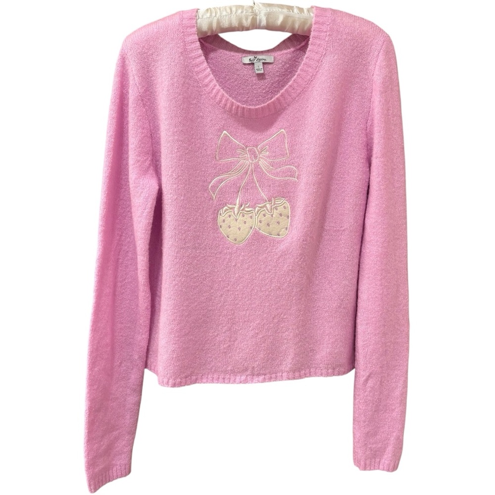 Cute light pink sweater with strawberry bow, juniors large